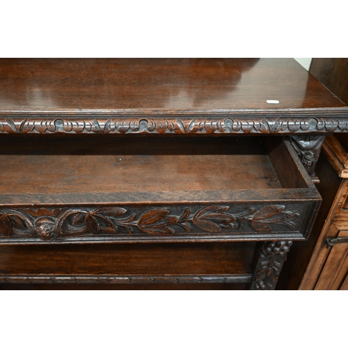 132 - A late Victorian Irish carved oak buffet with raised back, single drawer and open shelves, 120 x 52 ... 