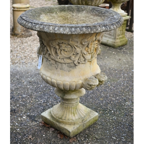 110 - A large pair of weathered cast stone campagna urns, 80 cm h, one with detached handle, present... 