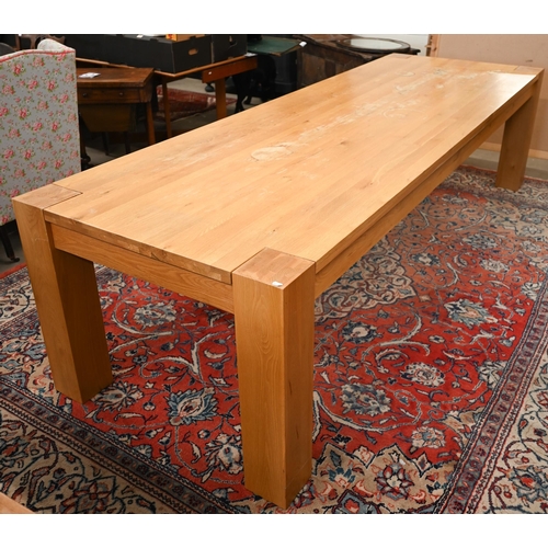 220 - A large contemporary light oak corner-leg dining table, rectangular top with square supports (remove... 