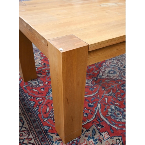 220 - A large contemporary light oak corner-leg dining table, rectangular top with square supports (remove... 