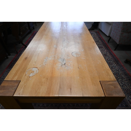 220 - A large contemporary light oak corner-leg dining table, rectangular top with square supports (remove... 