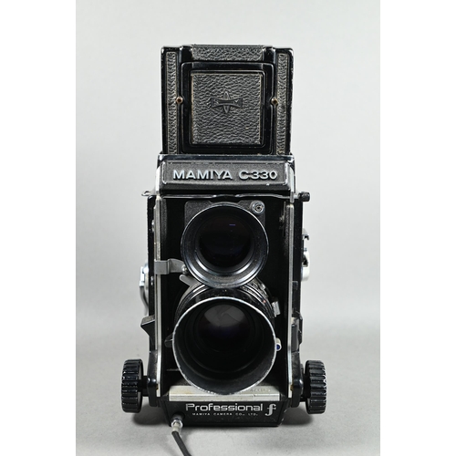 502 - Three Mamiya C330 twin-lens reflex cameras with accessories