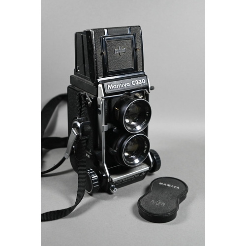 502 - Three Mamiya C330 twin-lens reflex cameras with accessories