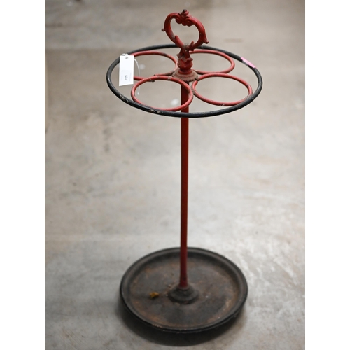 518 - A vintage painted iron circular umbrella stand