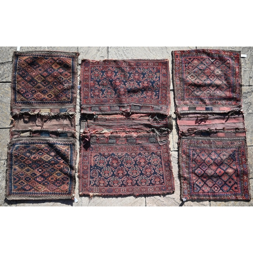 279 - Three antique Persian saddle bags (3)