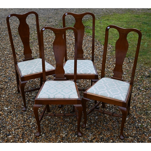 107 - A set of four Georgian style dining side chairs, with 'vase' shaped backrests and fabric seat pads (... 