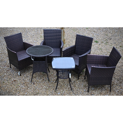 114 - A modern synthetic rattan garden terrace set comprising four armchairs, a circular table and a small... 