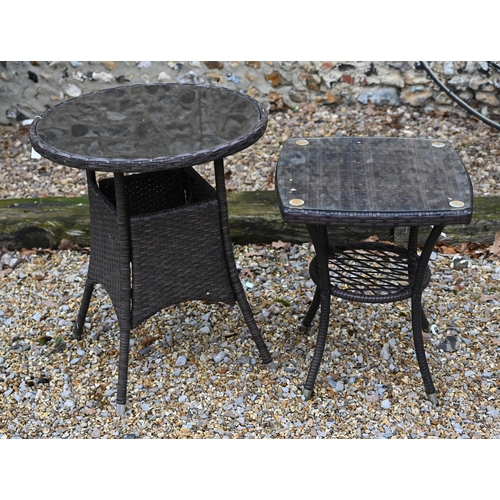 114 - A modern synthetic rattan garden terrace set comprising four armchairs, a circular table and a small... 