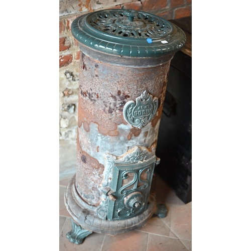 118 - An early 20th century French Godin enamelled cast iron stove