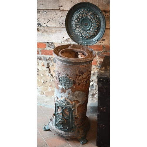 118 - An early 20th century French Godin enamelled cast iron stove