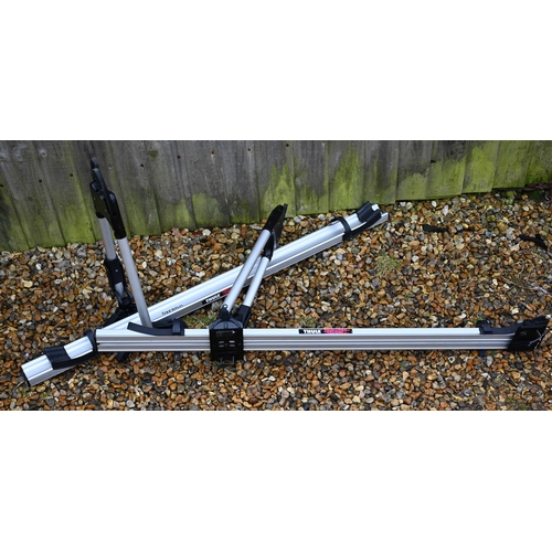 124 - Two boxed Thule 510 tour bike carriers - missing keys