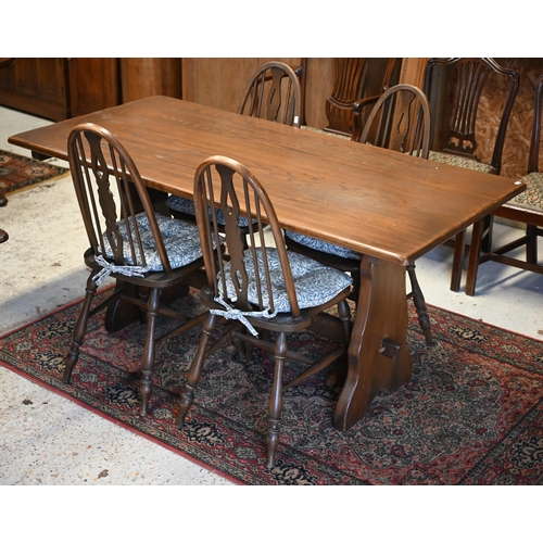 14 - An Ercol style elm dining table and four side chairs, 160 cm x 77 cm x 74 cm (5)