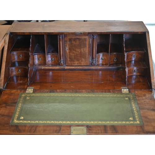 184 - A Georgian walnut fall front-bureau with fitted interior over dummy drawer, two short and two long d... 