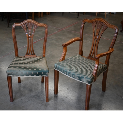 187 - A set of 1950s reproduction dining chairs in the Chippendale manner - 6 standard + 2 carvers c/w cop... 