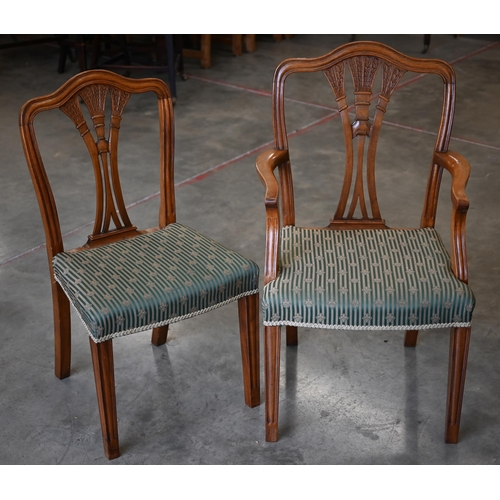 187 - A set of 1950s reproduction dining chairs in the Chippendale manner - 6 standard + 2 carvers c/w cop... 