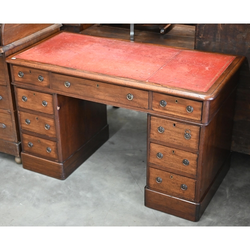 194 - A late Victorian mahogany twin-pedestal desk with gilt-tooled red leather top over nine drawers, 120... 