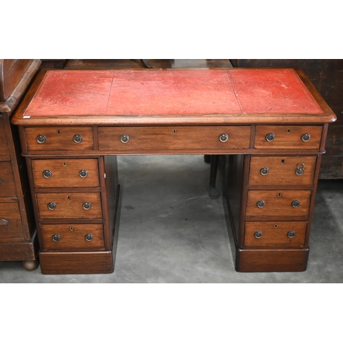 194 - A late Victorian mahogany twin-pedestal desk with gilt-tooled red leather top over nine drawers, 120... 