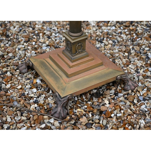 198 - An adjustable brass classical column standard lamp on stepped square platform base with paw feet