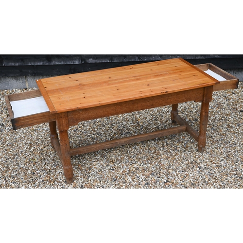 200 - A pine farmhouse kitchen dining table with cleated rectangular top on turned supports, 154 x 74 x 76... 