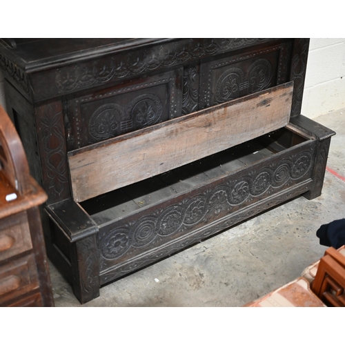 207 - #An antique Continental carved oak dresser in dark stained finish, 136 cm wide x 55 cm deep x 200 cm... 