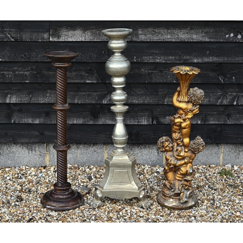 209 - A composite cherub torchere stand to/w two other torchere stands; one spiral turned mahogany and one... 