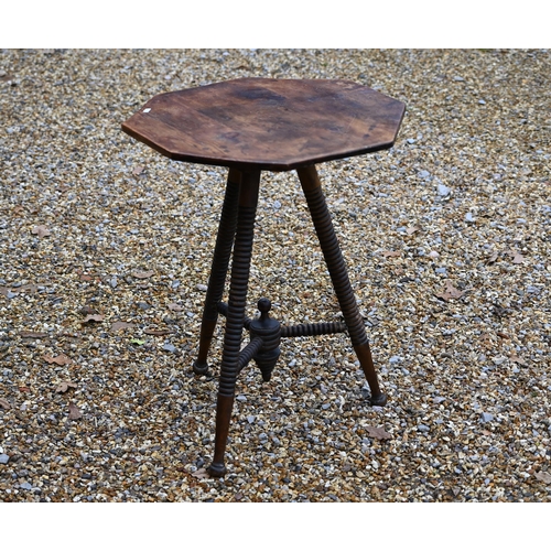 211 - A provincial octagonal side table on ring turned stained beech base, 55 cm wide x 70 cm high