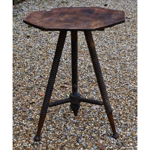 211 - A provincial octagonal side table on ring turned stained beech base, 55 cm wide x 70 cm high