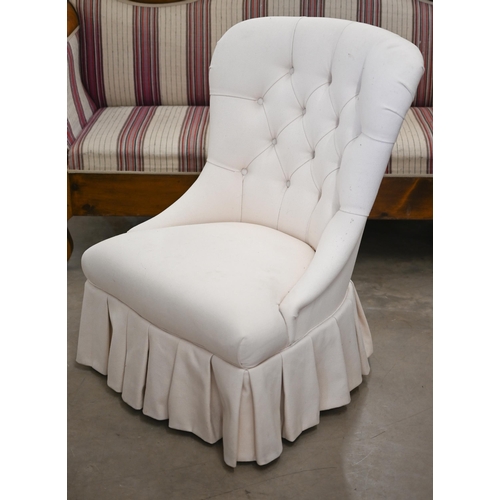 216 - A cream upholstered button back bedroom chair, a/f