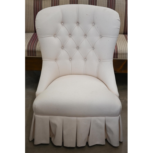 216 - A cream upholstered button back bedroom chair, a/f