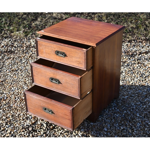 221 - An early 20th century camphor three-drawer campaign chest with flush-fitting brass handles, 54 cm wi... 