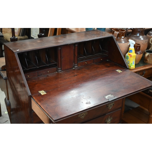 227 - #A George III mahogany fall front bureau with fitted interior over four long graduating drawers rais... 