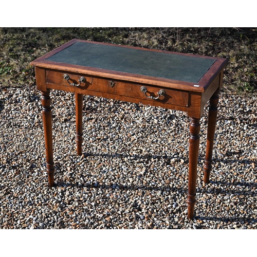 228 - A 19th century walnut writing table with green leather top, single frieze drawer and turned supports... 