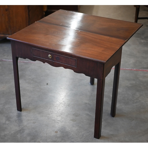 231 - A 19th century mahogany folding tea-table with frieze drawers, 84 x 40 x 72 cm highHandle detached b... 