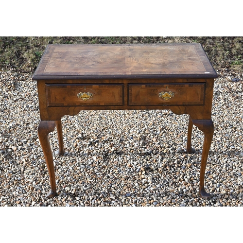 233 - A walnut Queen Anne style crossbanded two-drawer hall table on cabriole supports a/f, 90 x 52 x 74 c... 