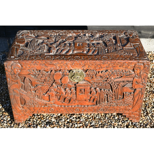 235 - A Chinese carved hardwood and camphor lined coffer/blanket chest with brass clasp, 100 x 50 x 60 cm ... 