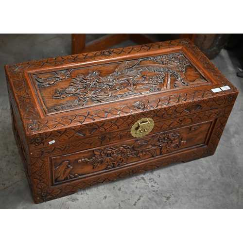 241 - A small Chinese carved hardwood camphor-lined blanket chest/coffer with brass clasp, 86 x 40 x 40 cm