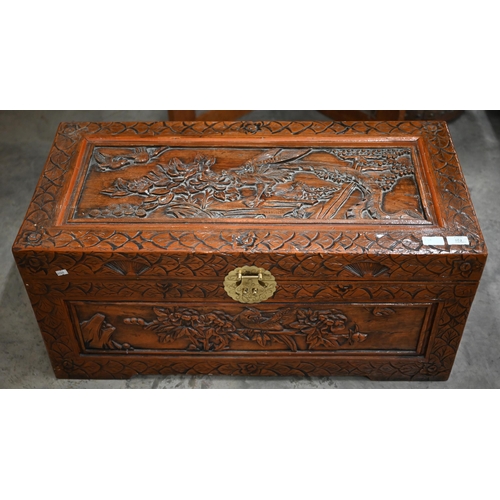 241 - A small Chinese carved hardwood camphor-lined blanket chest/coffer with brass clasp, 86 x 40 x 40 cm