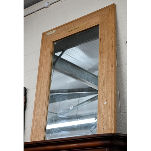 243 - A large rectangular mirror in moulded ash frame, 150 x 100 cm