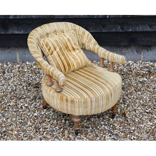 248 - A 19th century horseshoe shaped salon chair with yellow striped upholstery and walnut frame to/w mat... 