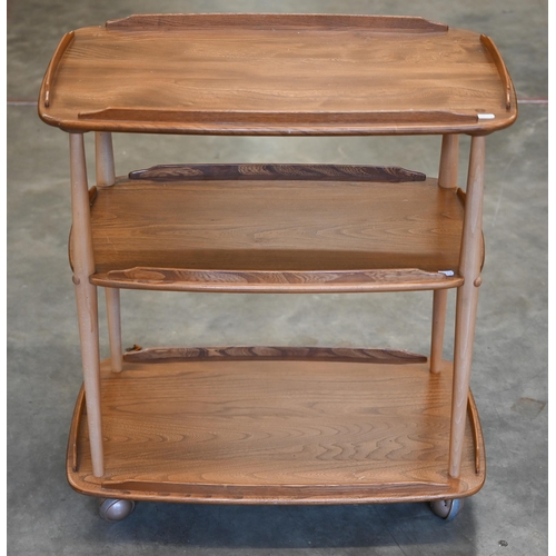 249 - An Ercol (blue label) elm and beech drinks trolley on ball casters, 72 cm wide x 46 cm deep x 78 cm ... 