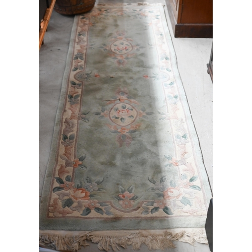 258 - A Chinese cut wool floral runner, teal ground, 244 x 79 cm