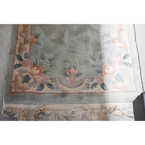 258 - A Chinese cut wool floral runner, teal ground, 244 x 79 cm