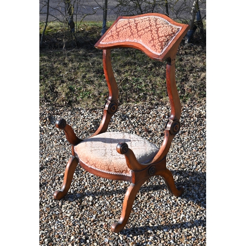 268 - A Regency mahogany elbow chair, peach damask upholstery