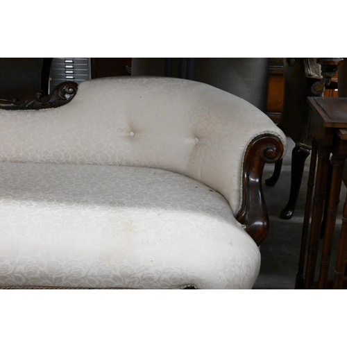 276 - A mahogany framed scroll-end chaise with shaped back, acanthus carved shaped legs, foliate upholster... 