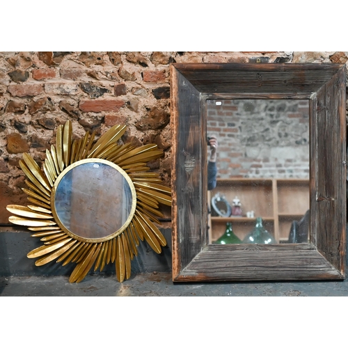 278 - A rectangular mirror in rustic stained pine frame, 101 x 81 cm to/w gilt 'palm frond' design mirror,... 