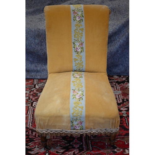 283 - A Victorian walnut framed nursing chair in mustard velour and tapestry upholstery