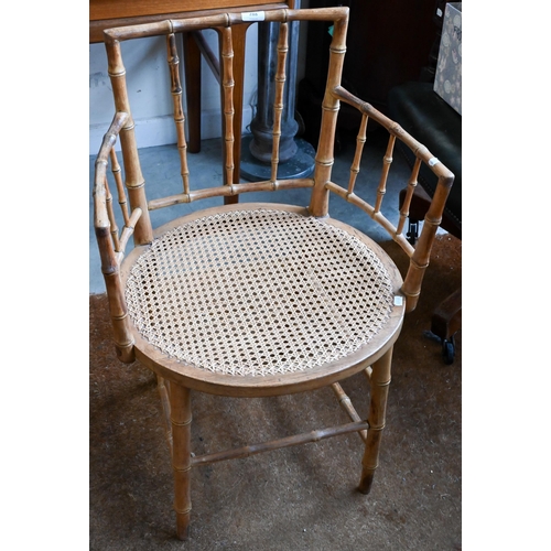 288 - A beech simulated bamboo framed elbow chair with caned seat