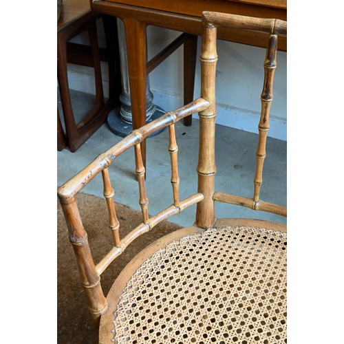 288 - A beech simulated bamboo framed elbow chair with caned seat