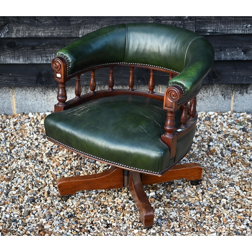 289 - A mahogany framed green leatherette desk chair