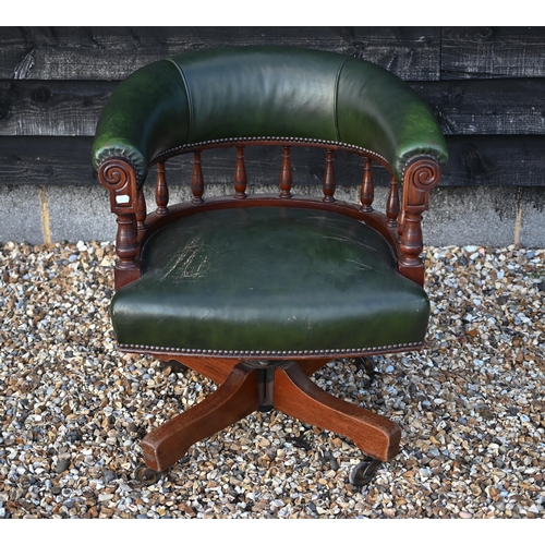 289 - A mahogany framed green leatherette desk chair